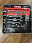 Sears Craftsman 7PC Metric Reversible Ratcheting Wrench Set 42407 8-18MM. Fixed Price $210.00.