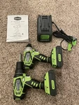Greenworks Drill And Impact Driver With Batteries, Charger Bits.. Fixed Price $88.00.